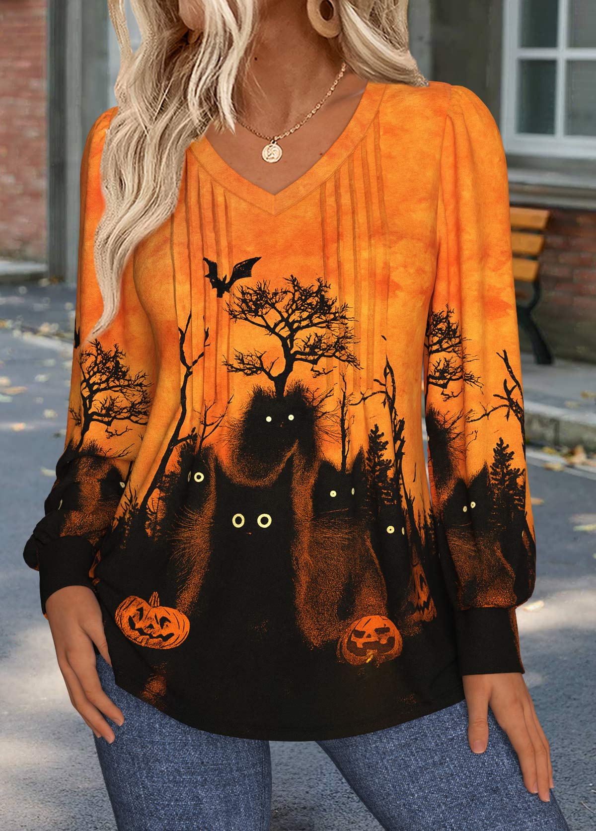 Camiseta de manga larga naranja de Halloween con costuras visibles