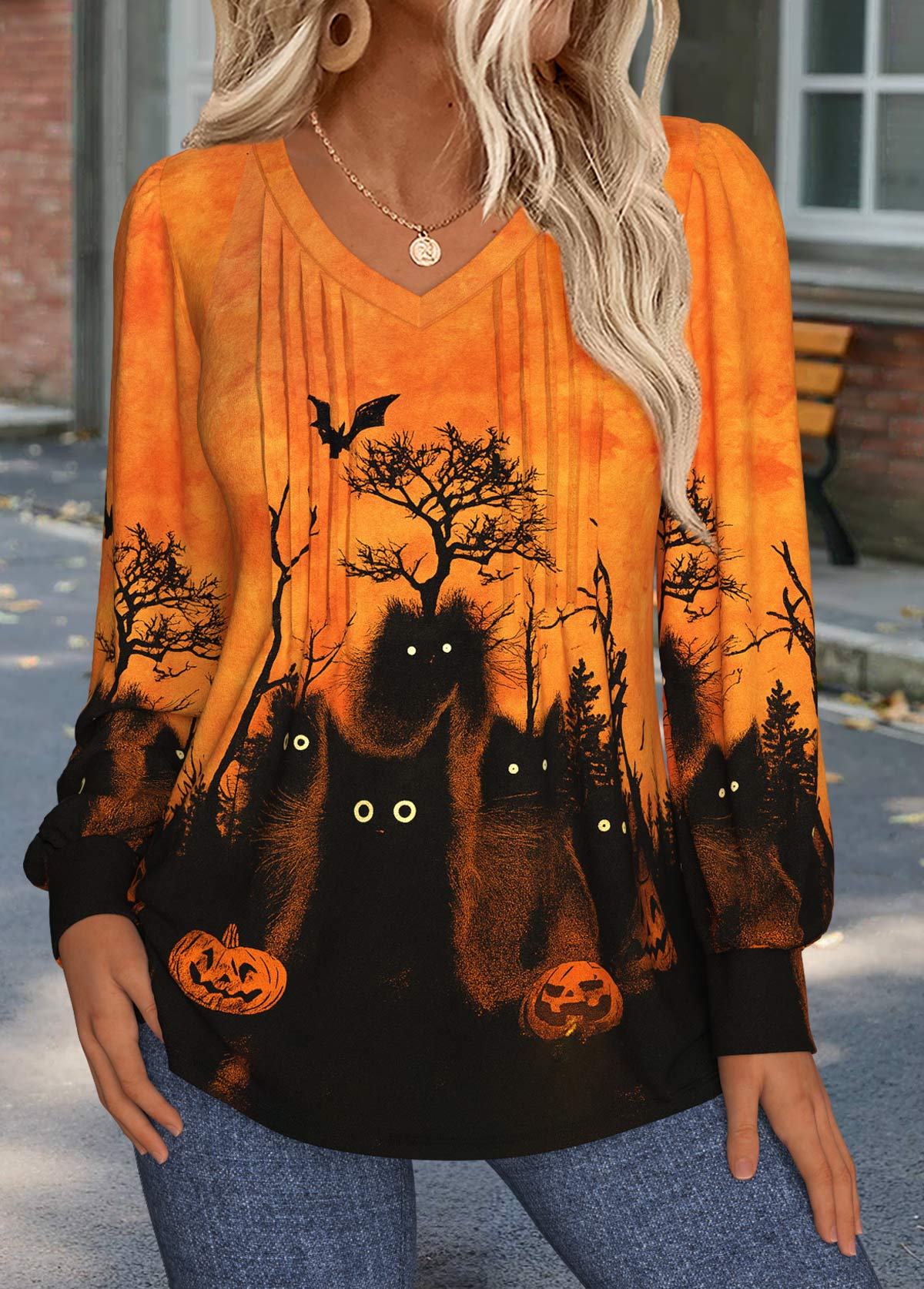 Camiseta de manga larga naranja de Halloween con costuras visibles