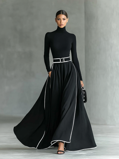 Vestido negro con ribetes blancos