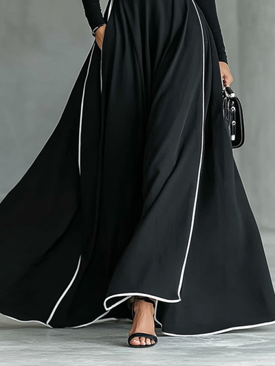 Vestido negro con ribetes blancos