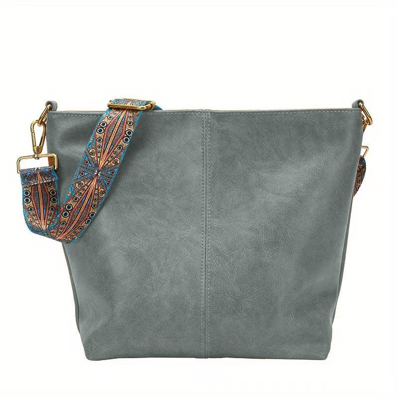 Bolso de hombro de cuero versátil