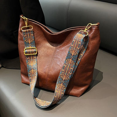 Bolso de hombro de cuero versátil
