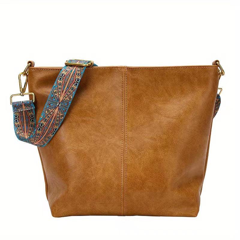 Bolso de hombro de cuero versátil